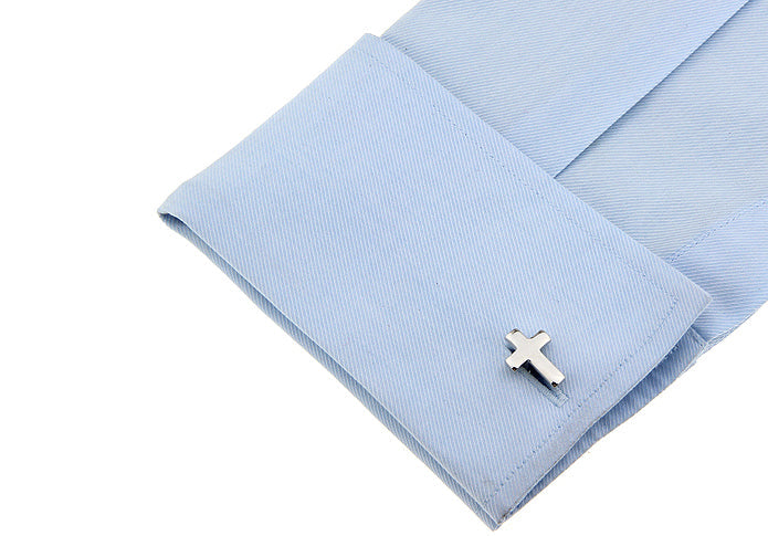 Christian silver cross cufflinks worn with dress shirt for church or formal wear

