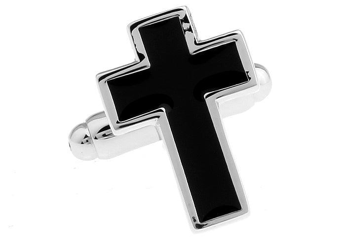Single silver and black cross cufflink close-up