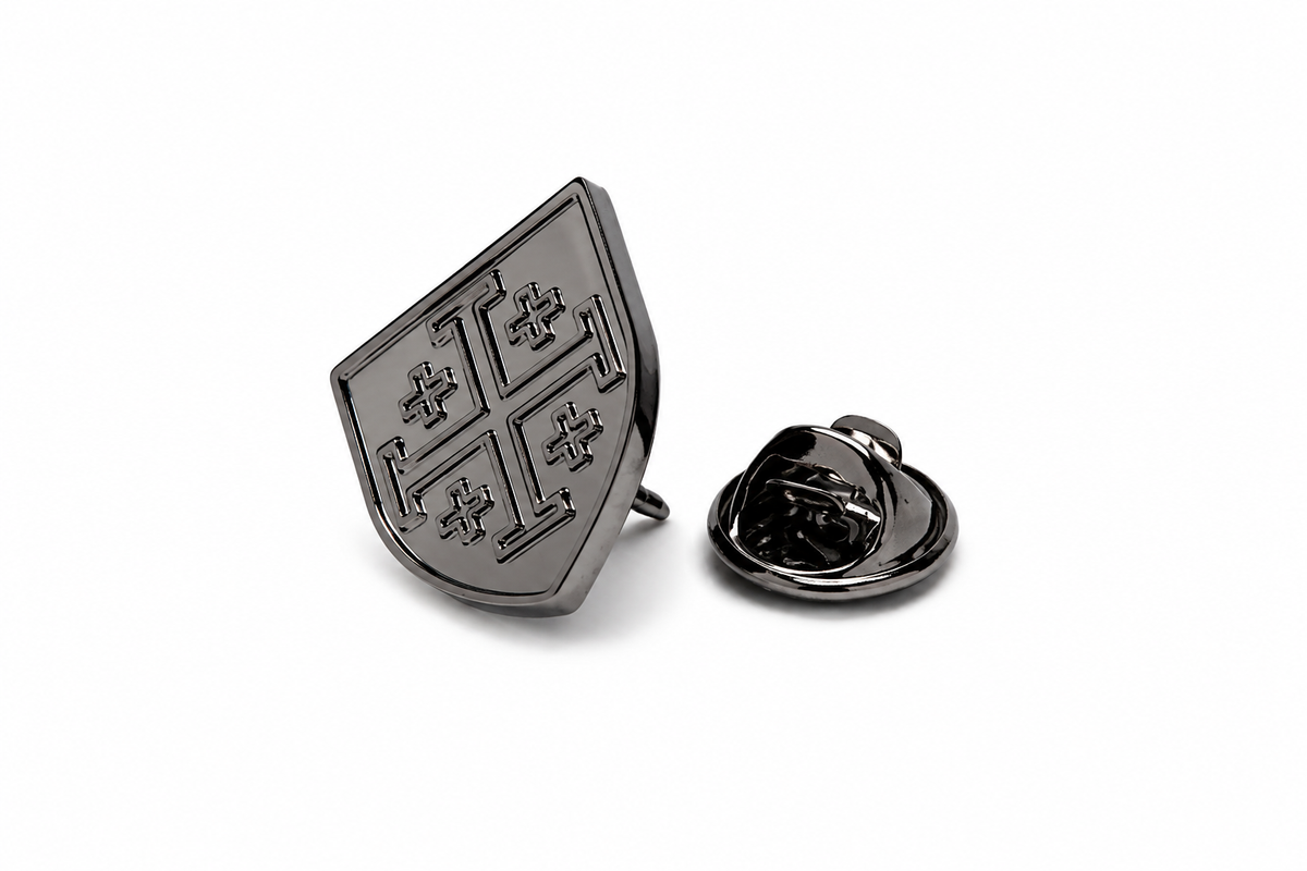 A dark metallic shield-shaped lapel pin with a cross motif, shown alongside its reverse clasp on a clean white background. Gunmetal Jerusalem Cross shield lapel pin for men with clutch back