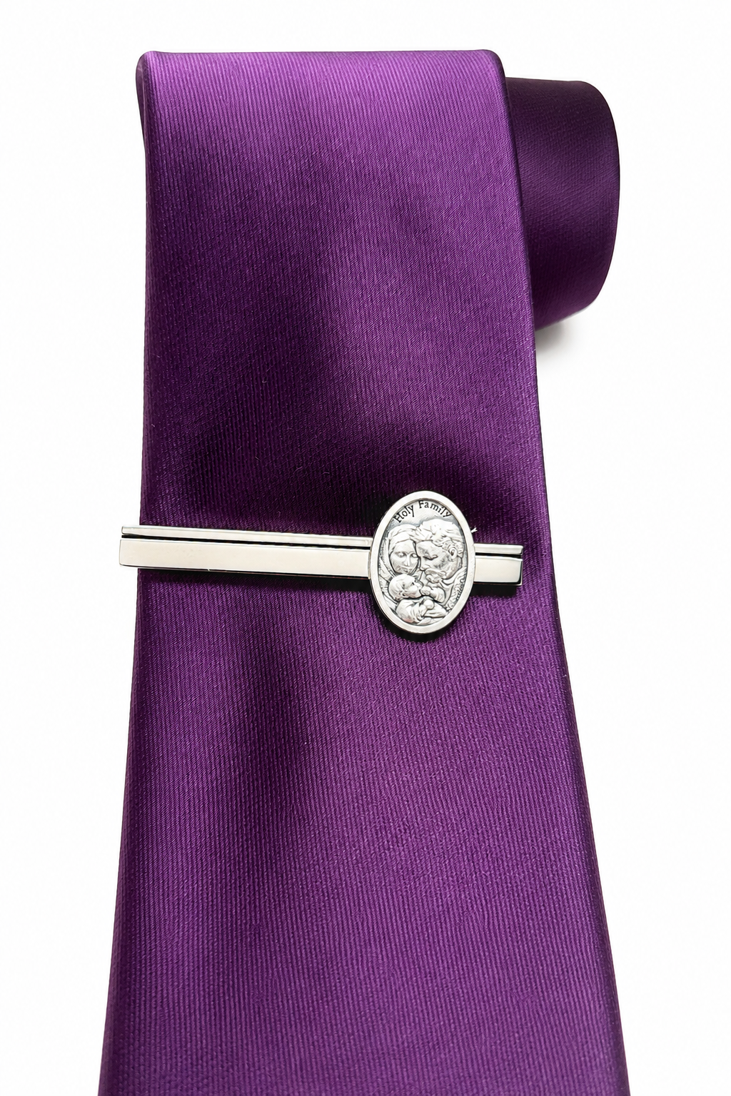 silver Holy Family tie clip close up detailed Jesus Mary Joseph medallion mens religious accessory