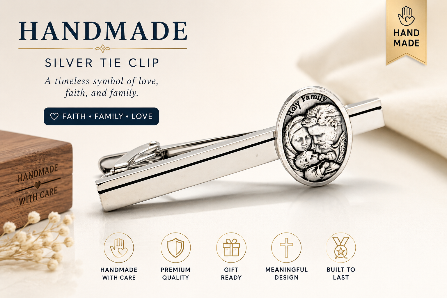 Silver tie clip with engraved design on a light background, featuring text about its symbolism.