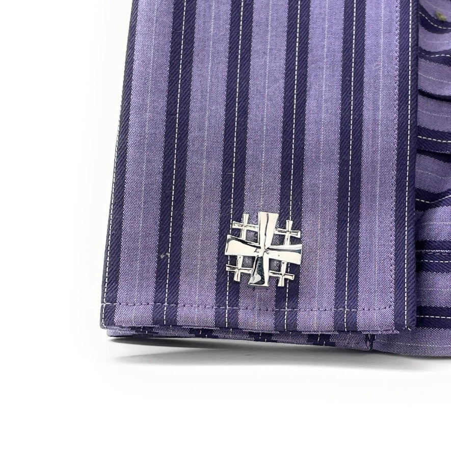 Christian cufflinks on French cuff dress shirt