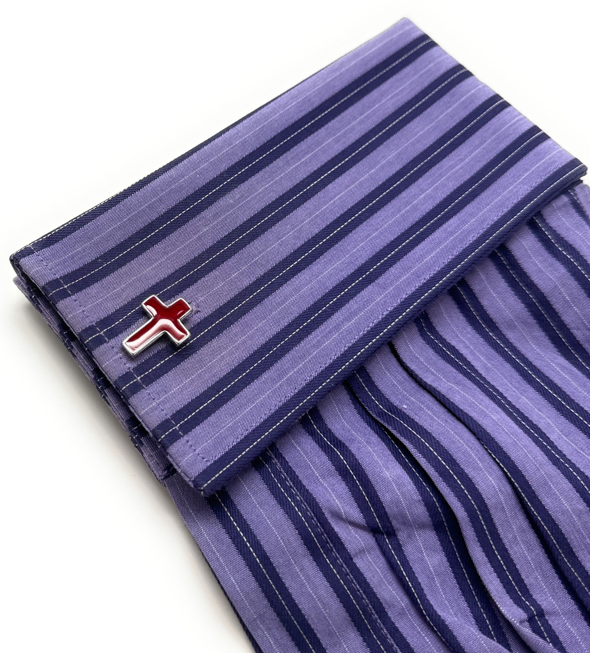 Men’s red cross cufflinks worn with dress shirt for church or formal occasions
