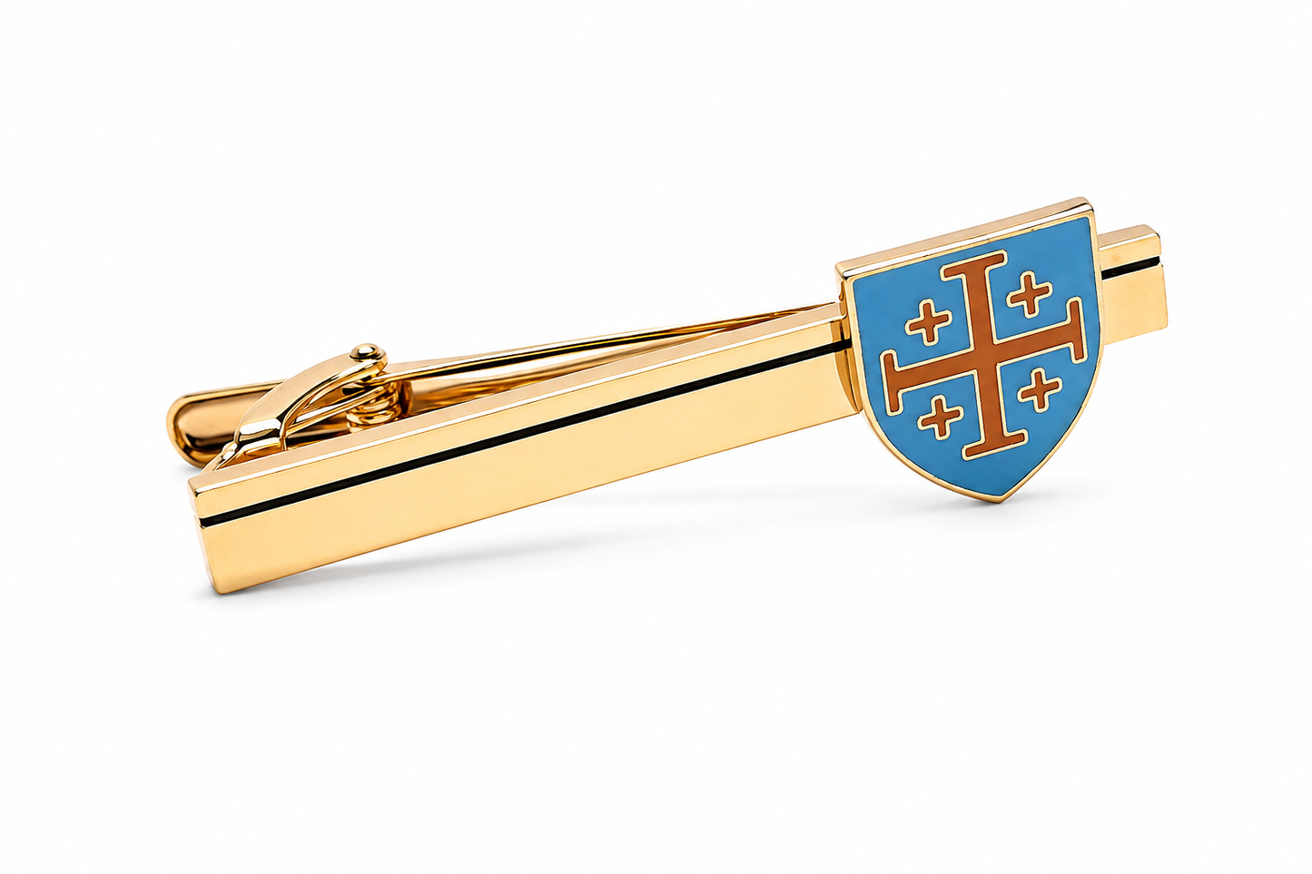 A gold tie bar featuring a shield-shaped blue enamel emblem with a red cross and four smaller crosses, shown on a clean white background.