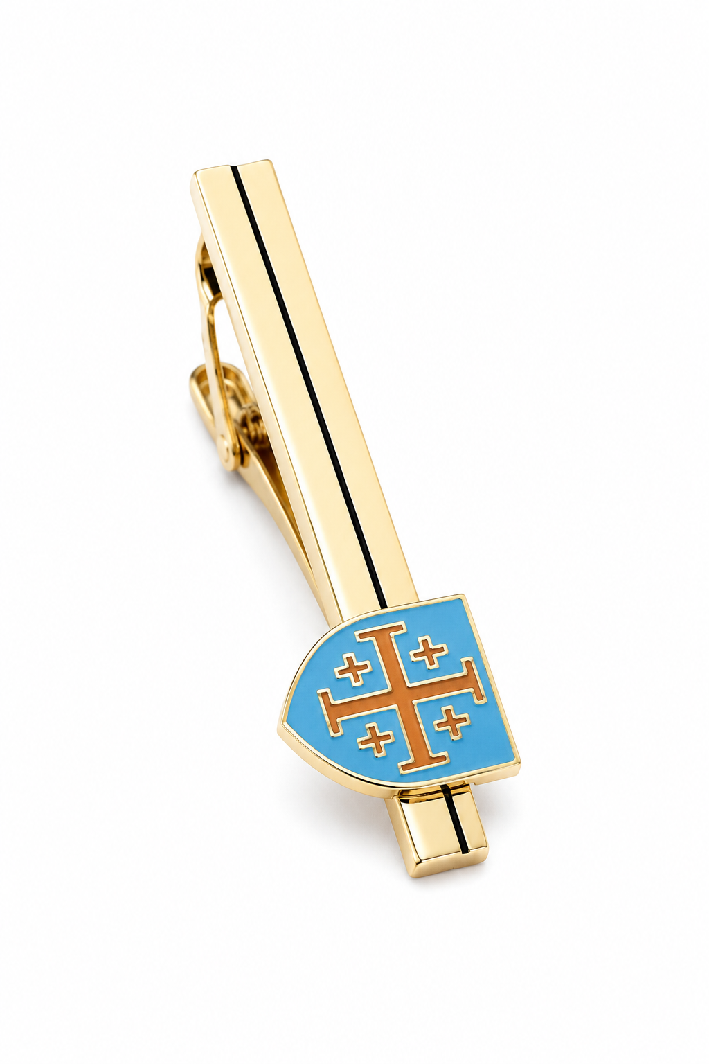 A gold-toned tie clip featuring a shield-shaped blue enamel inlay with a gold cross motif, shown on a clean white background.