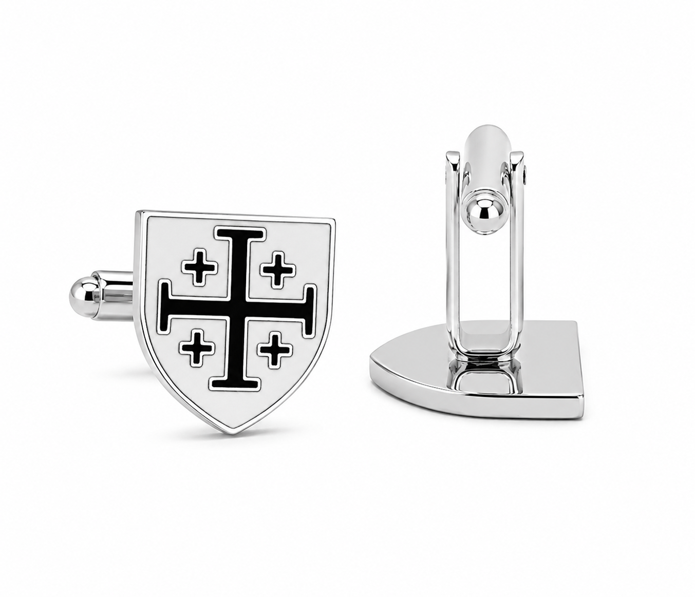 A pair of silver-toned shield-shaped cufflinks on a white background. One cufflink is shown from the front, featuring a black enamel cross design with four smaller crosses inside a larger cross.