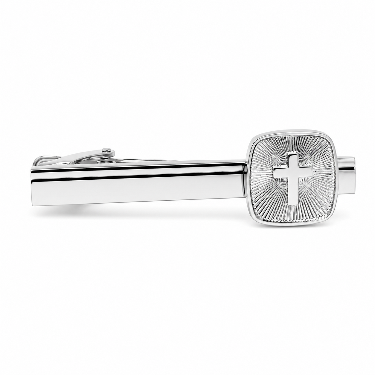 Silver tie clip with cross design on a white background