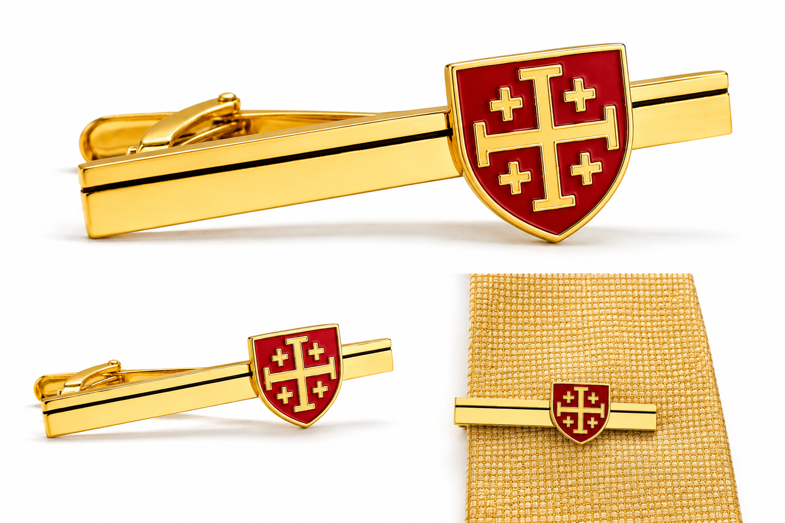 Gold tie clip with red emblem on a white background