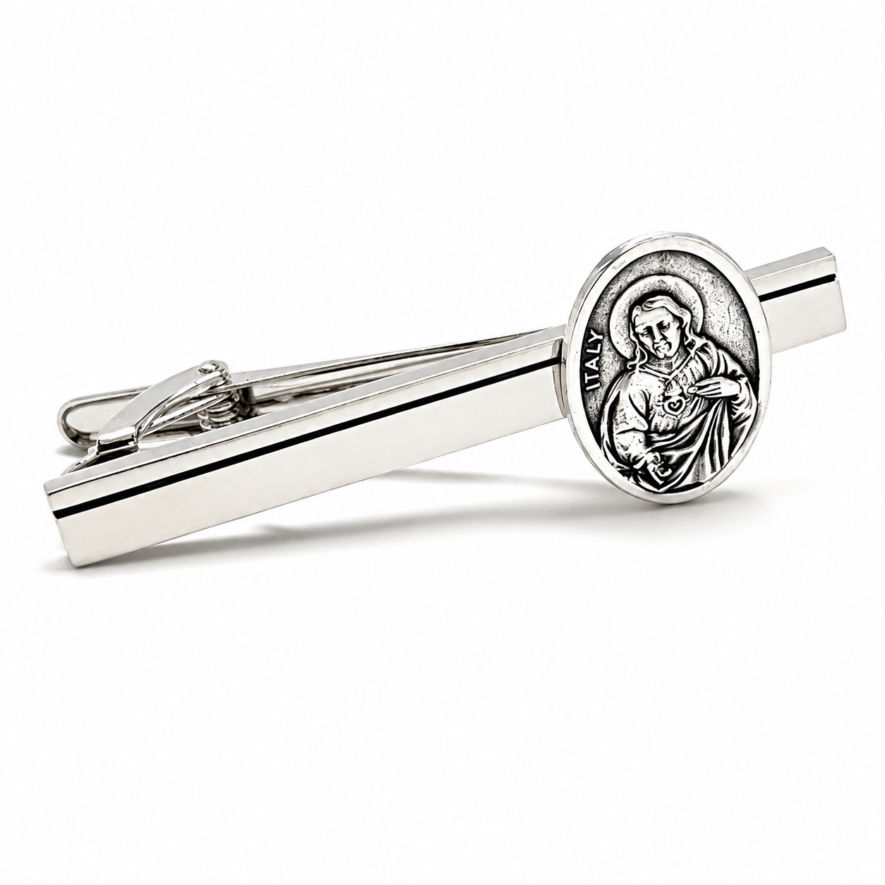Sacred Heart of Jesus silver tie clip for men with black accent stripe on white background