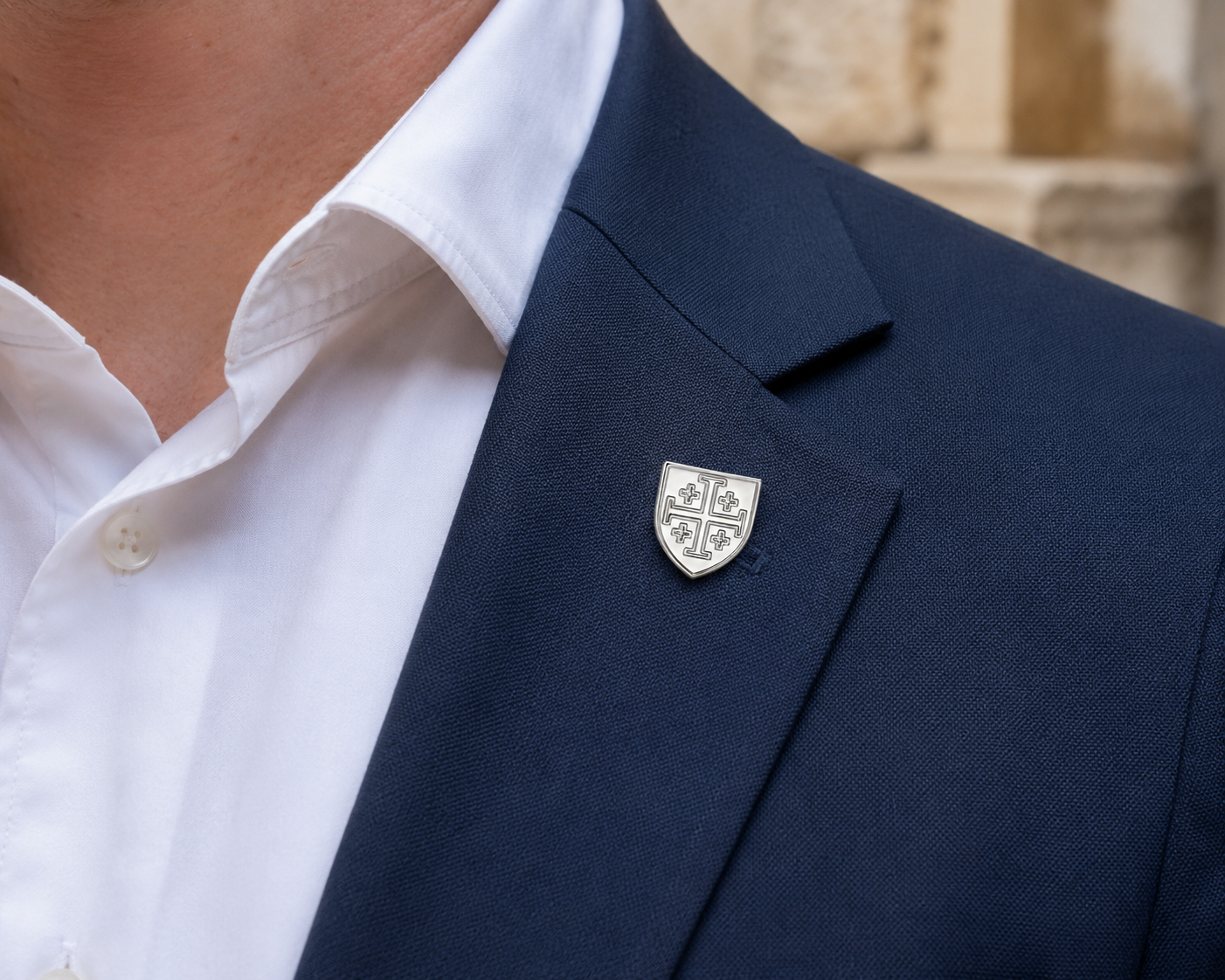 Silver Jerusalem Cross lapel pin  blue suit