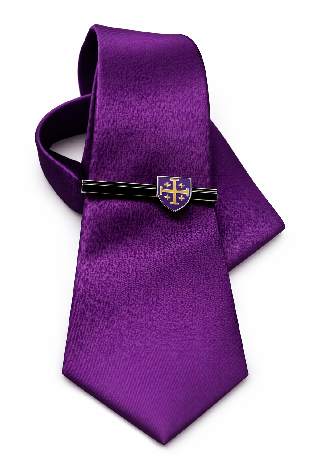 Purple tie with a decorative clip on a white background