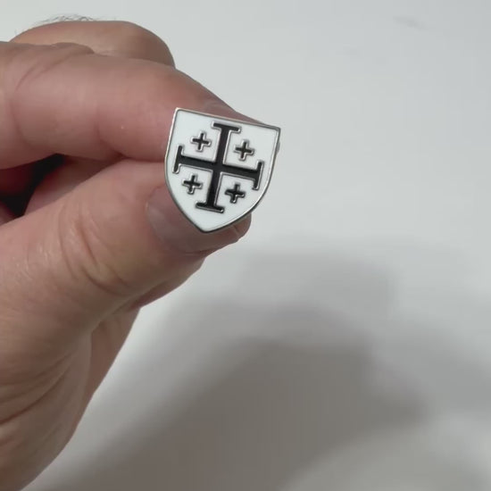 Black and white Jerusalem Cross shield lapel pin with silver-tone finish and butterfly clutch backing.