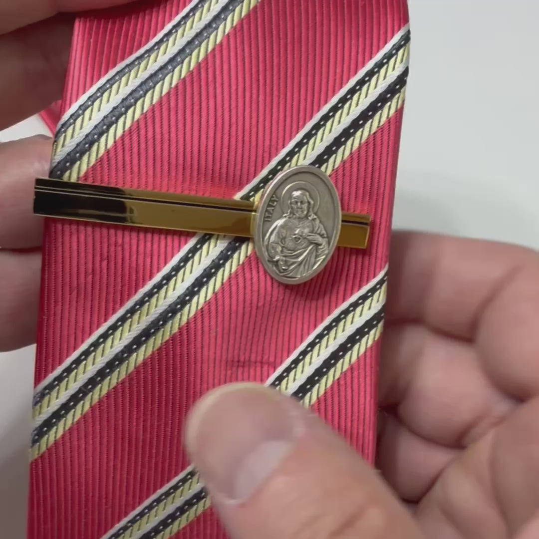 Sacred Heart Heritage Tie Clip featuring an authentic Italian Sacred Heart medallion mounted on a polished gold tie bar for Catholic men.